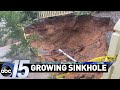 Growing sinkhole has neighbors concerned
