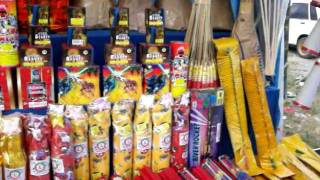 preview picture of video 'Fireworks salesman at the Wet Market across from Uniwide, Tarlac City, Philippines'