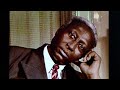 THE FOLK BOX - Lead Belly:  "Meetin' at the Buildin' (All Over This World)"  (1946)