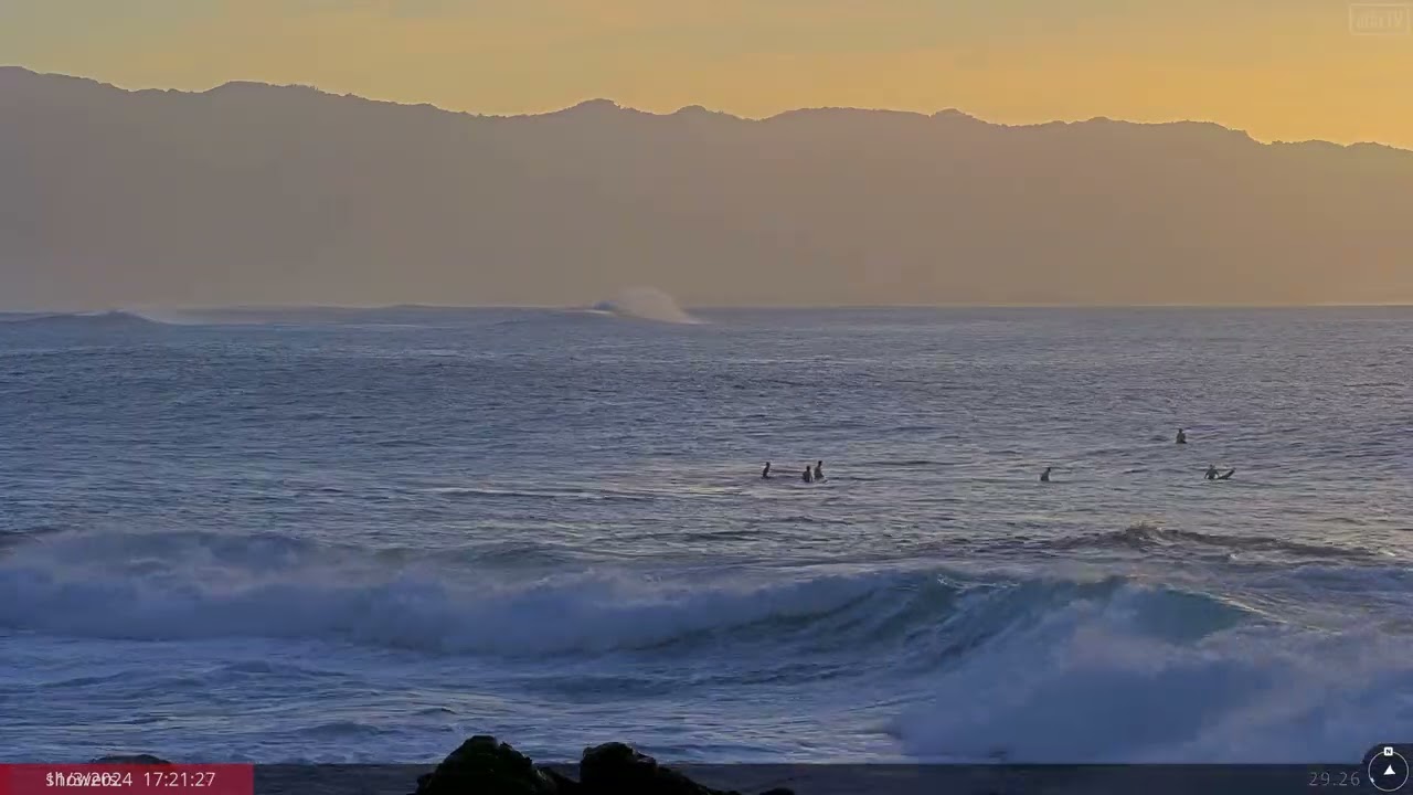 Nov 3, 2024: Surfing at Waimea Bay at Sunset, Hawaii