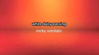 White daisy passing => Rocky Votolato