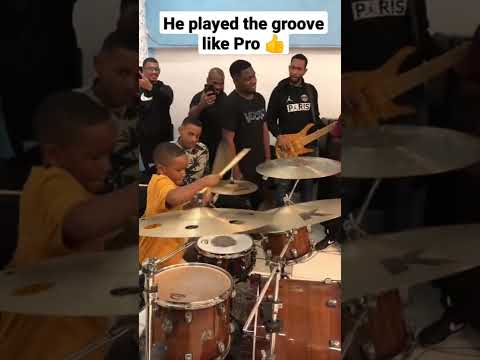 Kid playing the groove like a Pro