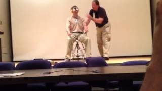 Dr Frost tries out the motion sickness chair