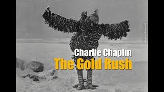 Charlie Chaplin transforms into a chicken .The Gold Rush