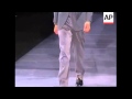Adrien Brody And Clive Owen Attend Armani Menswear Show