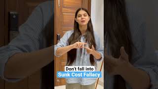 What is sunk cost fallacy?