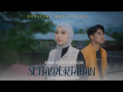 Aprilian Ft Rheka Restu - Setia Bertahan ( Official Music Video )