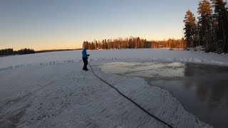 Making an ice skating area on the lake
