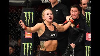 ‘Naked’ UFC star suffers in ring wardrobe malfunction after bursting out of top