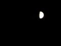 Waxing Gibbous Moon On Cloudy Summer Night