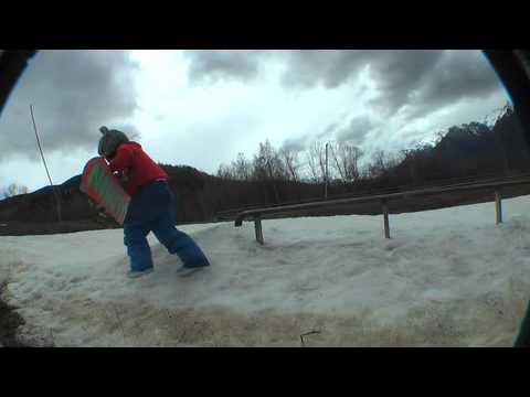 Lukas Rodriguez kids 8 years jibbing snowboard. Cerler