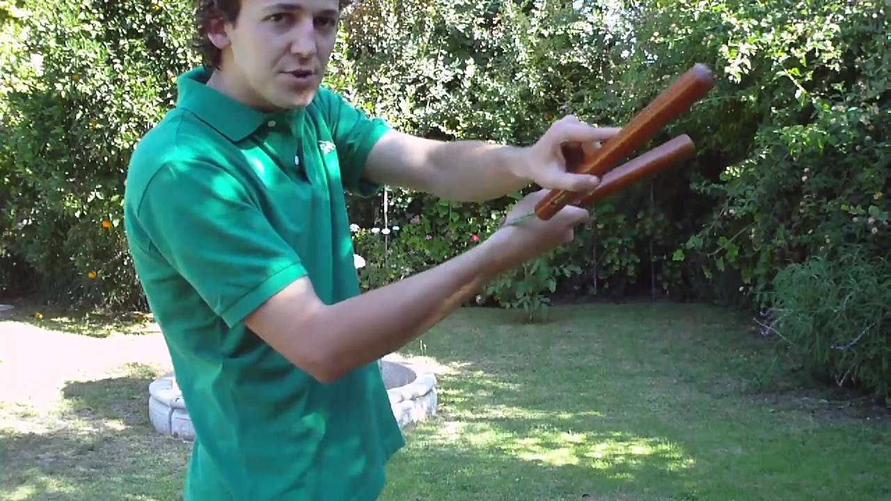 Back grip up spin figure 8 nunchaku