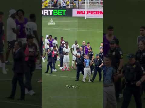 Ohio police drag away football pitch invader in pre-World Cup friendly