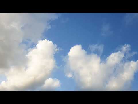 Timelapse of clouds / blue sky and moving clouds video background footage