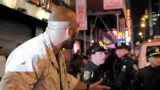 U.S. Soldier protects protesters from NYPD riot Police !