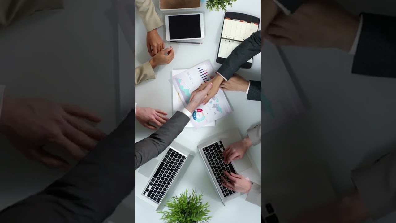 People In Business Ending A Meeting With A Shake Hand