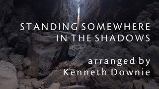 Standing Somewhere In The Shadows  [Lyrics]