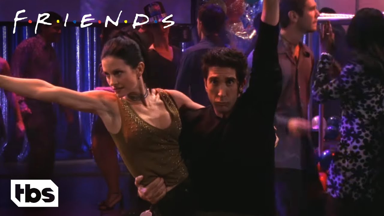 Friends: Monica and Ross Try To Get On Camera For New Year's Rockin' Eve (Season 6 Clip) | TBS