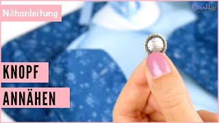 Knopf annähen Dirndl - Knopf per Hand annähen