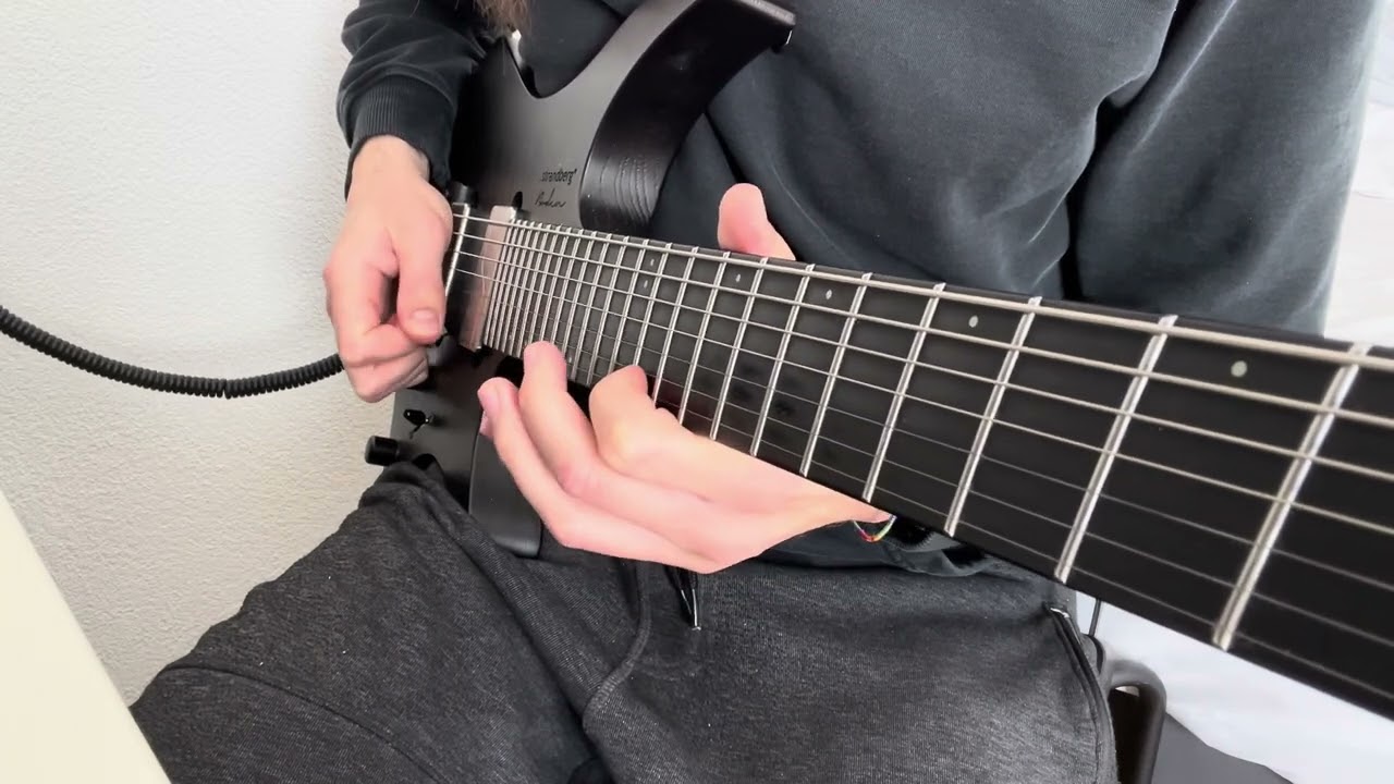 YouTube thumbnail: Roberto Barlocci playing The Riddle by Gigi D'Agostino on guitar.