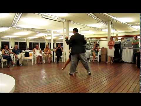  Alejandro Larenas  and  Marisol Morales  are  dancing  to  a  tango