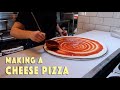 Making A Cheese Pizza Working At A Pizzeria