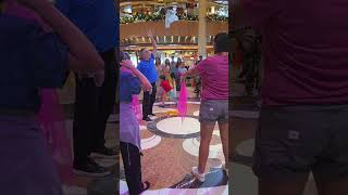Learning to juggle with scarfs with the cruise comedian, juggler Mark Niser on Royal Princess Cruise