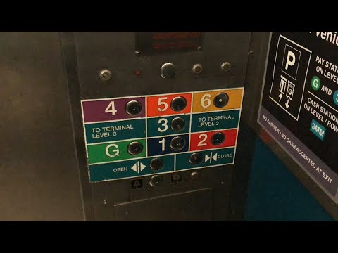 TERRIBLE Montgomery Traction Elevators @ MIA Dolphin Garage - Miami, FL.