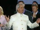 Benny Hinn sings "I STAND IN AWE OF YOU"