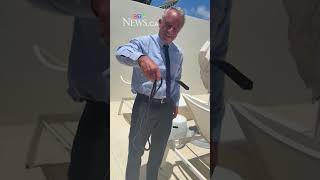 RFK Jr. picks up two snakes with his bare hands