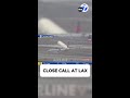 Near-miss between 2 planes at LAX caught on video