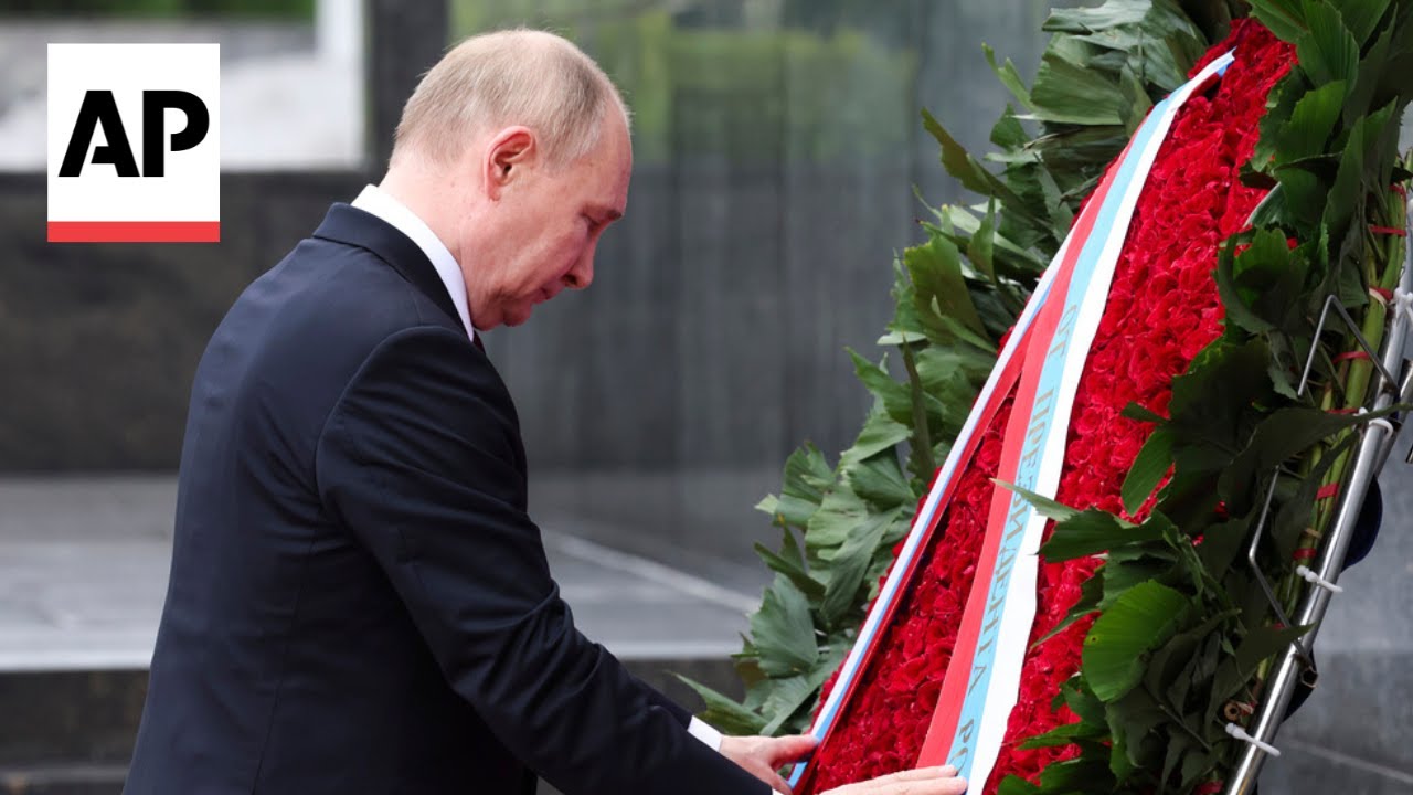 Russia's Putin lays wreaths at two Hanoi monuments during Vietnam state visit