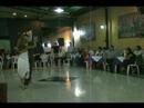  Sofiani Figueroa  and  John Erban  are  dancing  to  the  tango  "  Una Emocion  "