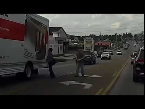 Pedestrian Receives Some Instant Karma When They Walk Straight Into An U-Haul Truck After Jaywalking