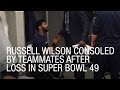 Russell Wilson Consoled By Teammates After Loss.
