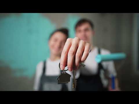 closeup house key keychain paint roller in hands o 2023 03 10 19 40 38 utc