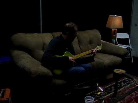 #41- Chuck noodling backstage with Ryans 'Caterpillar' guitar