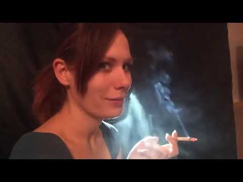 Woman smokes very heavily