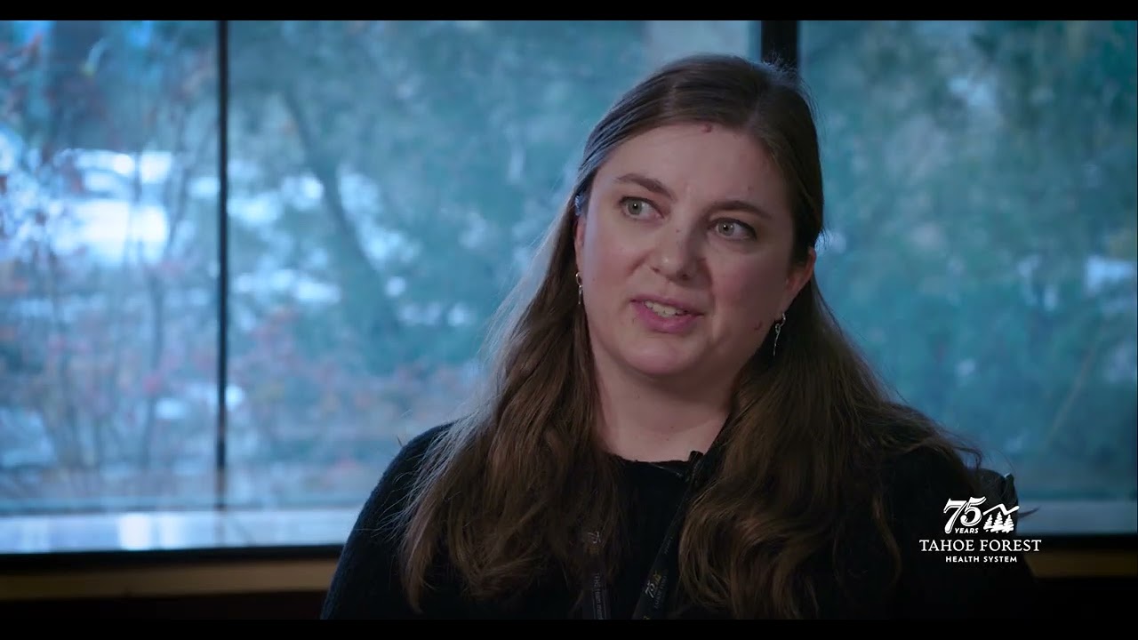 Sarah Redgrave, LCSW, licensed clinical social worker with Tahoe Forest Behavioral Health, sitting in front of a window