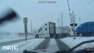 Caught on Video: Commuter Train Collides With FedEx Truck