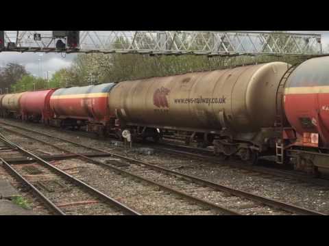 60001 with Murco 100 ton tankers through Gloucester station