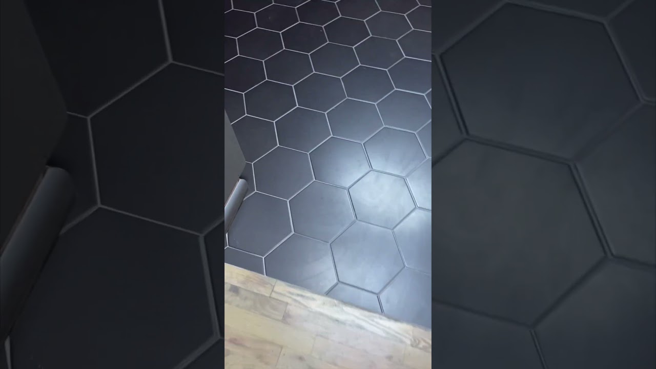 Tiling kitchen floor with flat black hexagon tiles, looks awesome but shows dirt 🥲 #tileideas #diy