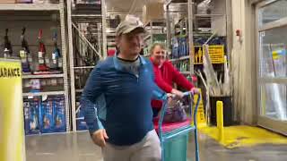 At Lowe’s Buying a trash can