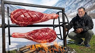 Roasting Two GIANT Juicy Beef Legs On A Rotating Grill!
