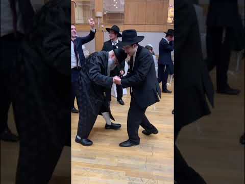 Eppinge Rebbe dances by the chasina of his son