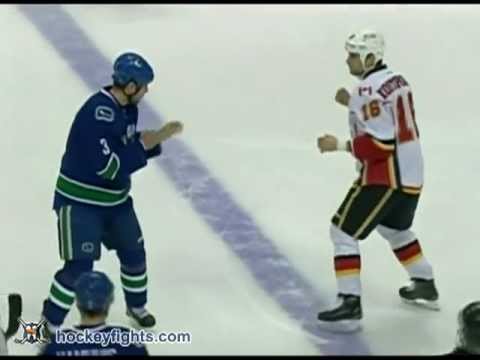 Tom Kostopoulos vs Kevin Bieksa Dec 23, 2011