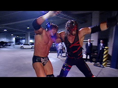 Kane chokeslams Triple H on a car: Raw, Oct. 21, 2002