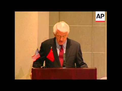 US and China officials at signing of trading act