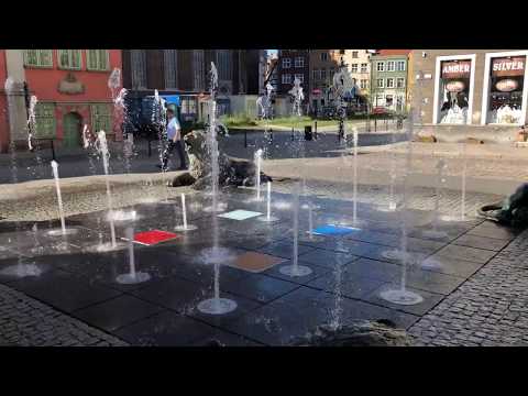 Eric Clark's Travel Videos - Gdansk Poland - Fountain during the day infront of churches