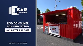 Röd container som fruktstånd